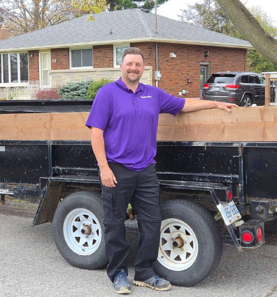 BagBuddies local operator standing beside a pickup trailer